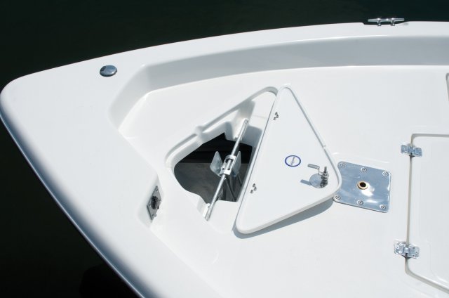 The definition of an outboard motor is a detachable engine mounted on outboard brackets on the stern of your boat.  This configuration will have only one single engine.