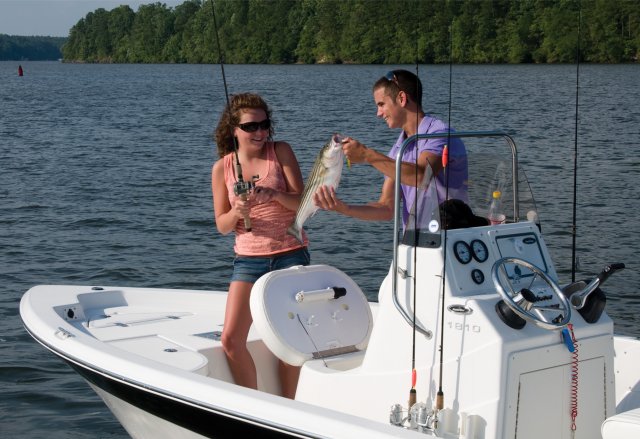 Glass fibers either loose or woven, reinforced with resin and used in the construction of many boats.