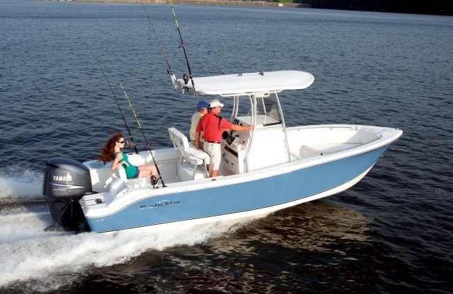 The definition of an outboard motor is a detachable engine mounted on outboard brackets on the stern of your boat.  This configuration will have only one single engine.