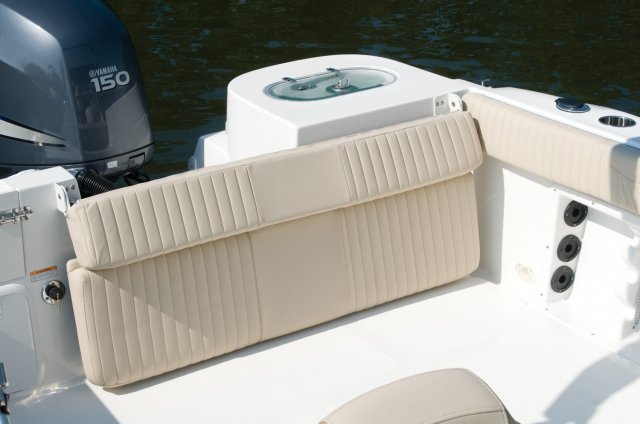 The definition of an outboard motor is a detachable engine mounted on outboard brackets on the stern of your boat.  This configuration will have only one single engine.