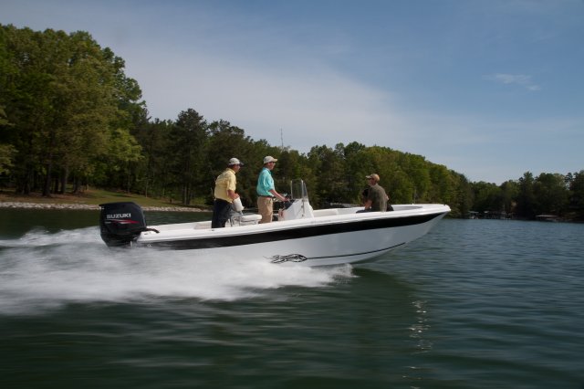 Center console is an open hull boat where the console of the boat is in the center. The boat deck surrounds the console so that a person can walk all around the boat from stern to bow with ease. Most center consoles are powered by outboard motors.