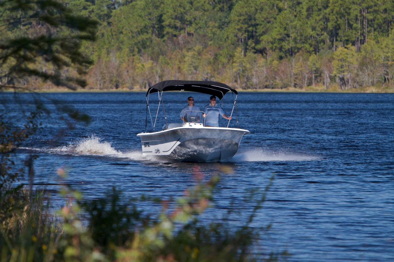 Glass fibers either loose or woven, reinforced with resin and used in the construction of many boats.