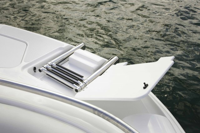 The deckboat is a cross between a bowrider and a pontoon boat.  It features a rather flat deck area with lots of room for people while still offering the speed and agility of a runabout.