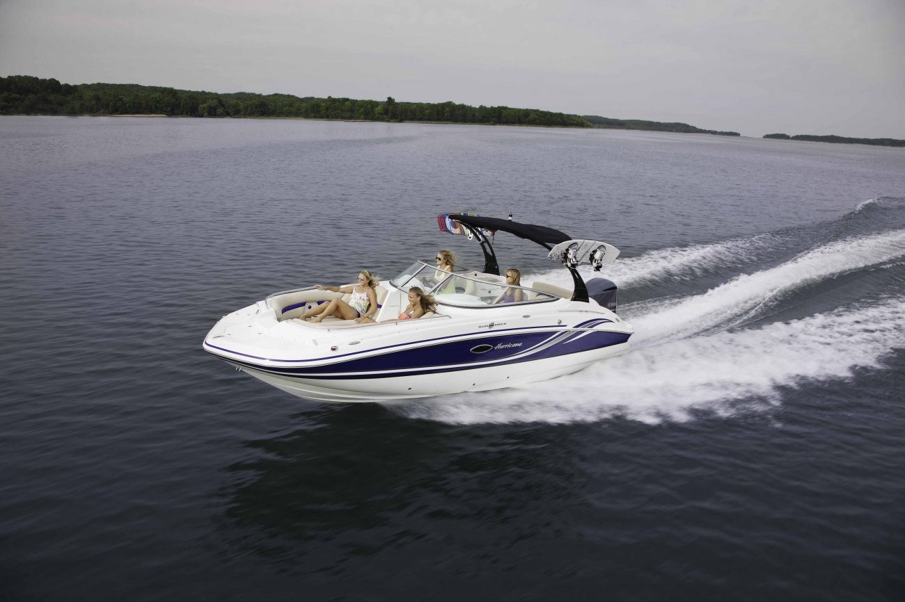 The deckboat is a cross between a bowrider and a pontoon boat.  It features a rather flat deck area with lots of room for people while still offering the speed and agility of a runabout.