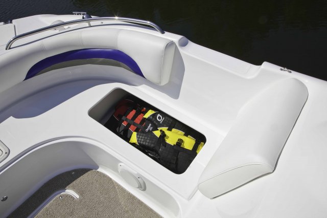 The deckboat is a cross between a bowrider and a pontoon boat.  It features a rather flat deck area with lots of room for people while still offering the speed and agility of a runabout.