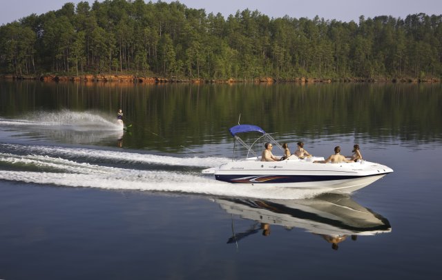 The deckboat is a cross between a bowrider and a pontoon boat.  It features a rather flat deck area with lots of room for people while still offering the speed and agility of a runabout.