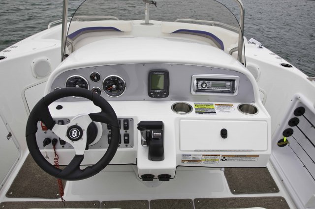 The deckboat is a cross between a bowrider and a pontoon boat.  It features a rather flat deck area with lots of room for people while still offering the speed and agility of a runabout.