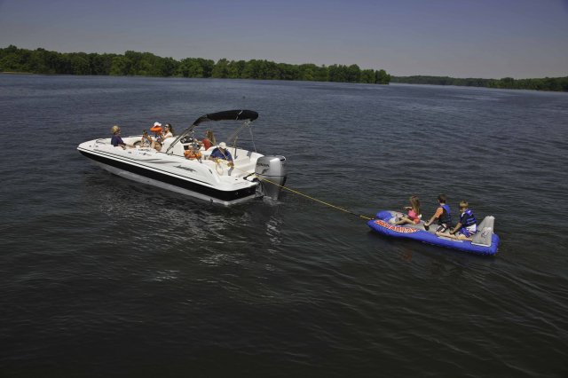 The deckboat is a cross between a bowrider and a pontoon boat.  It features a rather flat deck area with lots of room for people while still offering the speed and agility of a runabout.