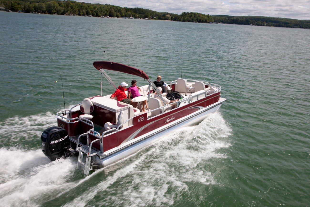 The definition of an outboard motor is a detachable engine mounted on outboard brackets on the stern of your boat.  This configuration will have only one single engine.