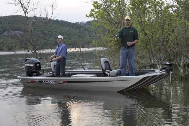 The definition of an outboard motor is a detachable engine mounted on outboard brackets on the stern of your boat.  This configuration will have only one single engine.